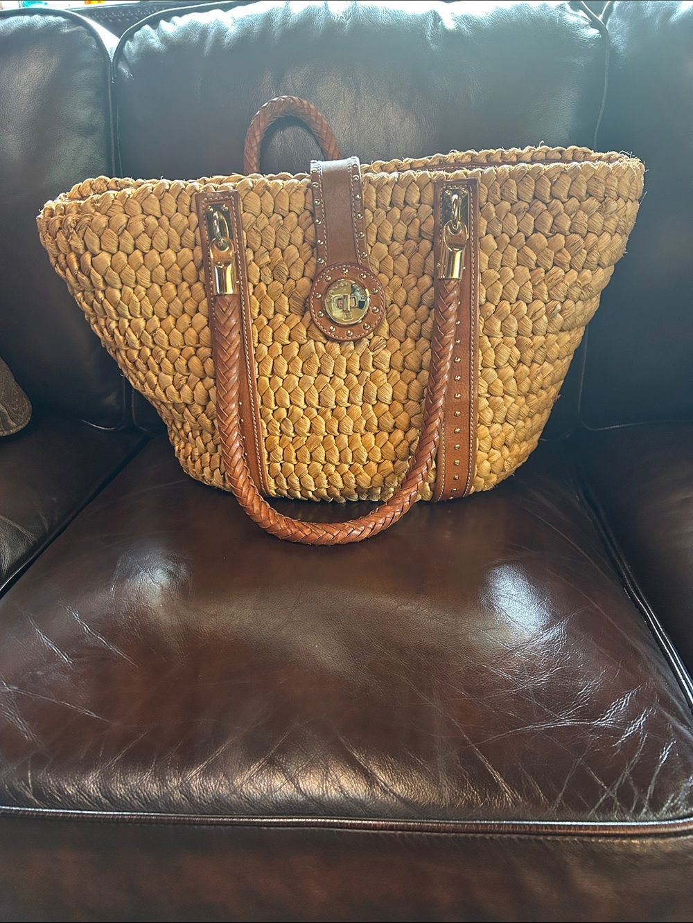 Michael Kors large straw tote with leather handles and leather detail inside